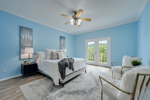 bedroom with french doors, access to outside, ornamental molding, ceiling fan, and light hardwood / wood-style floors