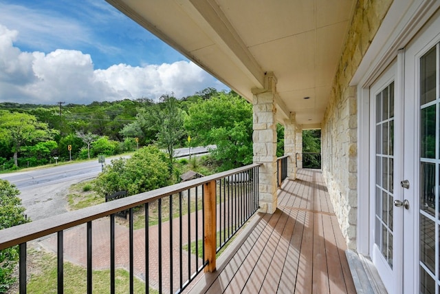 balcony featuring french doors