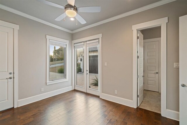 905 Madison Fork Dr, Lakeway, TX 78738 - unfurnished bedroom featuring access to outside, dark wood-style flooring, ornamental molding, and ceiling fan