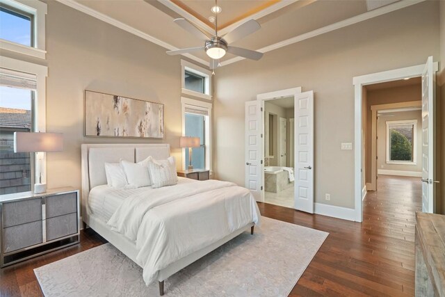 905 Madison Fork Dr, Lakeway, TX 78738 - bedroom featuring crown molding, dark wood-style flooring, a high ceiling, ensuite bathroom, and a ceiling fan