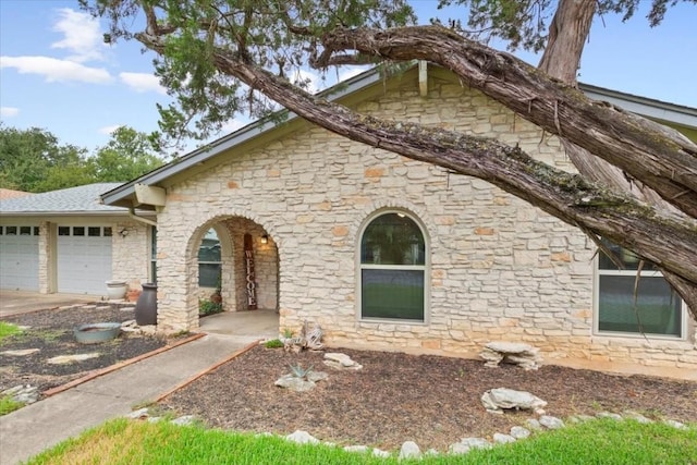 view of front of property with a garage