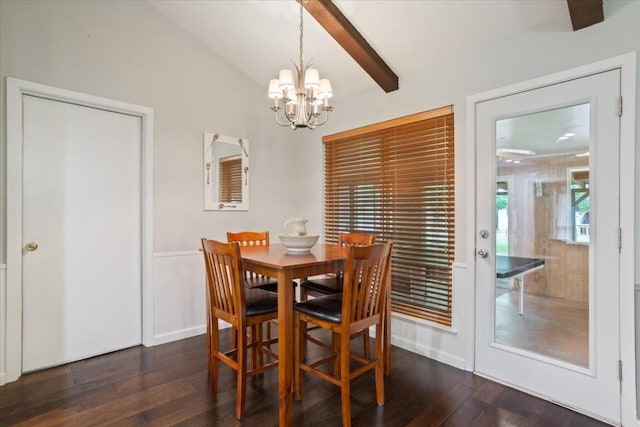 dining room with dark hardwood / wood-style flooring, a notable chandelier, and lofted ceiling with beams