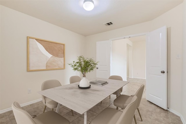 view of tiled dining space