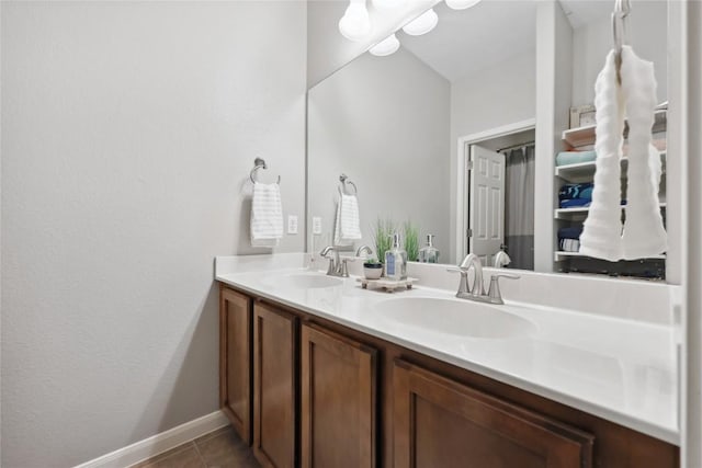 bathroom with vanity and tile patterned floors