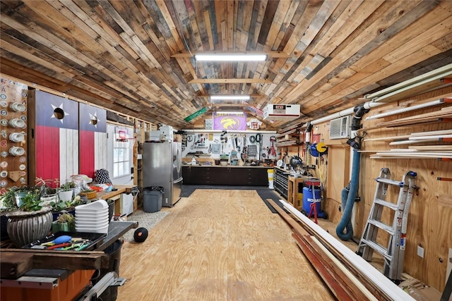 misc room featuring wood ceiling, vaulted ceiling, and a workshop area