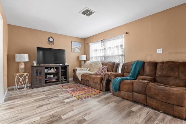 living room featuring light wood-type flooring