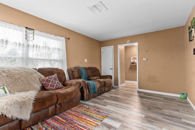 living room featuring light hardwood / wood-style floors