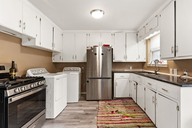 kitchen with white cabinetry, sink, and appliances with stainless steel finishes