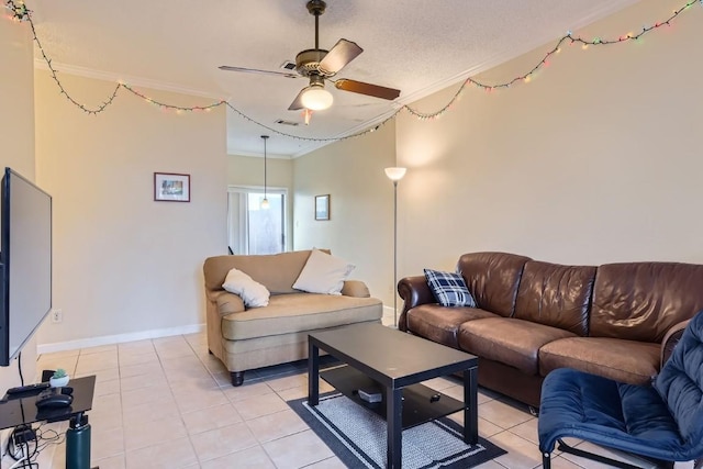 tiled living room with crown molding, a textured ceiling, and ceiling fan