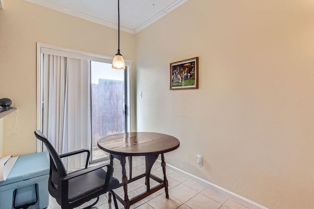 dining room with crown molding and light tile patterned flooring