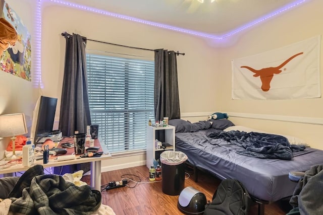 bedroom featuring hardwood / wood-style flooring