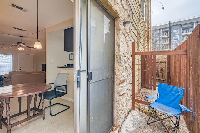 balcony featuring ceiling fan