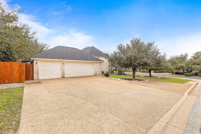 view of property exterior with a garage