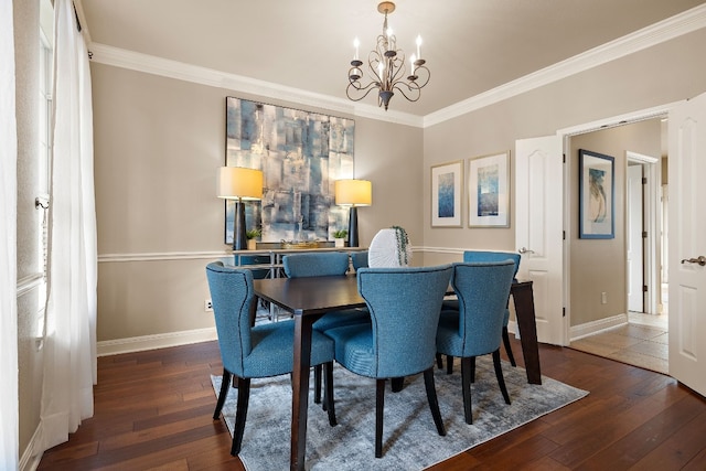 dining room with crown molding, a notable chandelier, and dark hardwood / wood-style flooring