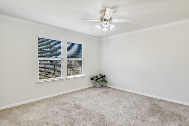 unfurnished room featuring crown molding, ceiling fan, and carpet