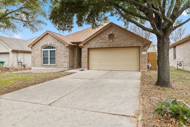 single story home featuring a garage