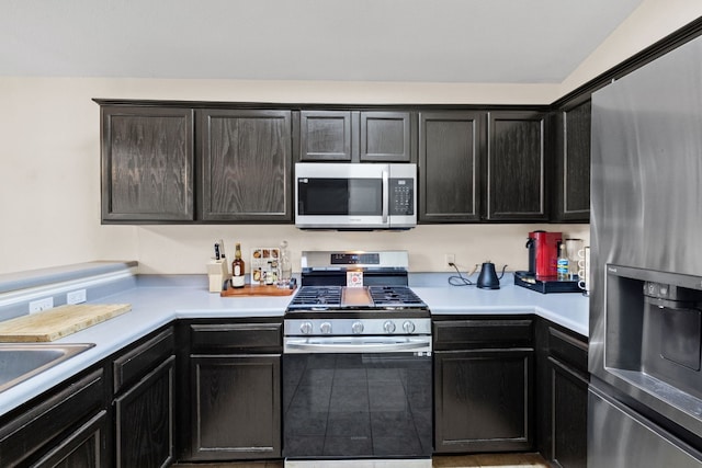 kitchen featuring appliances with stainless steel finishes and sink