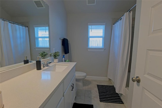 16817 Adoro Dr, Manor, TX 78653 - full bath featuring vanity, plenty of natural light, toilet, and baseboards