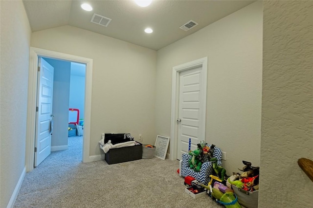 16817 Adoro Dr, Manor, TX 78653 - playroom with carpet floors, lofted ceiling, and baseboards