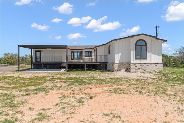 185 Eely Rd, Mcdade, TX 78650 - view of front of house with a deck