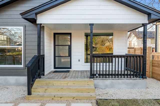 property entrance featuring a porch