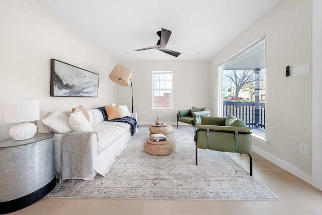 living room with ceiling fan