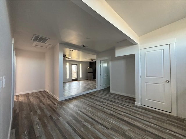 interior space featuring dark hardwood / wood-style floors and ceiling fan