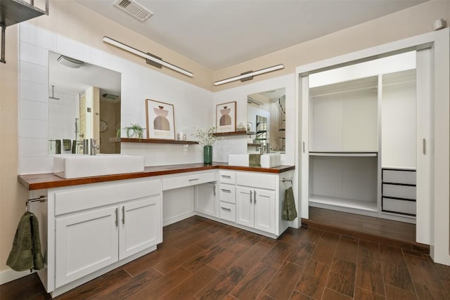 bathroom with wood-type flooring and vanity