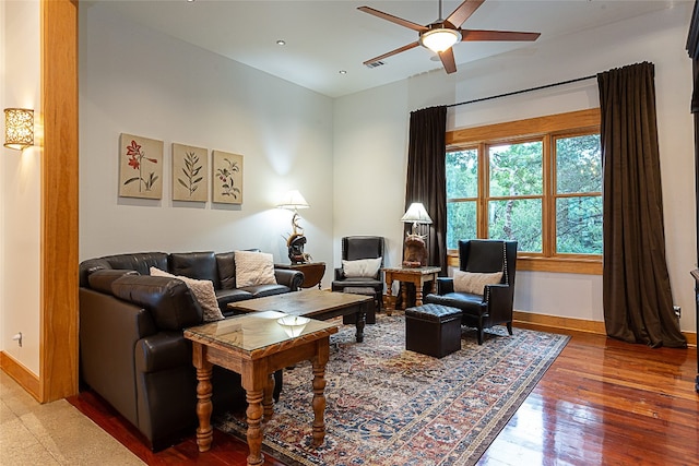 living room featuring hardwood / wood-style flooring and ceiling fan