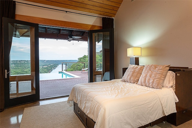 bedroom with lofted ceiling, wooden ceiling, and access to outside