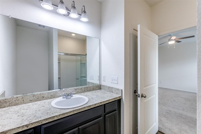 bathroom featuring vanity and ceiling fan