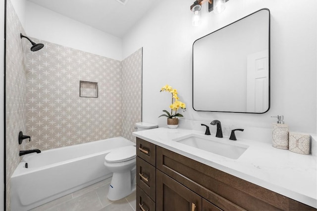 full bathroom featuring vanity, tile patterned floors, toilet, and shower / bath combination