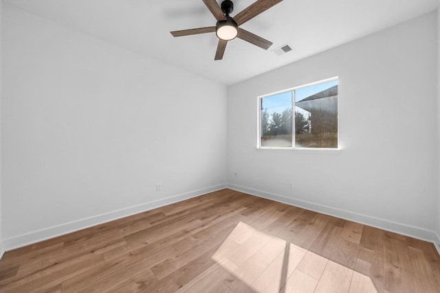 unfurnished room with ceiling fan and light hardwood / wood-style floors