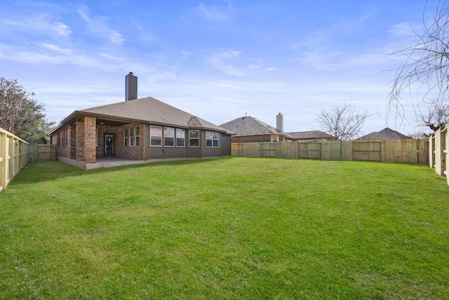 view of yard with a patio area