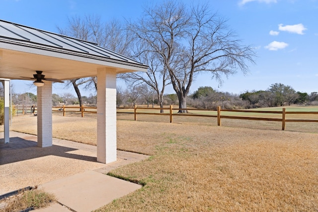 view of yard featuring ceiling fan