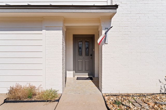 1210 Sun Ray, Horseshoe Bay, TX 78657 - view of exterior entry featuring brick siding