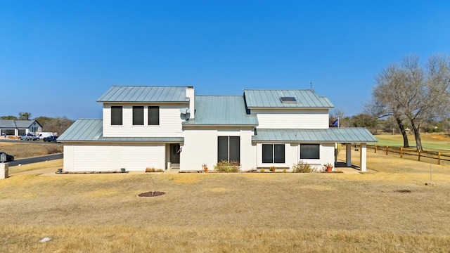 1210 Sun Ray, Horseshoe Bay, TX 78657 - view of front of house with a standing seam roof and a metal roof