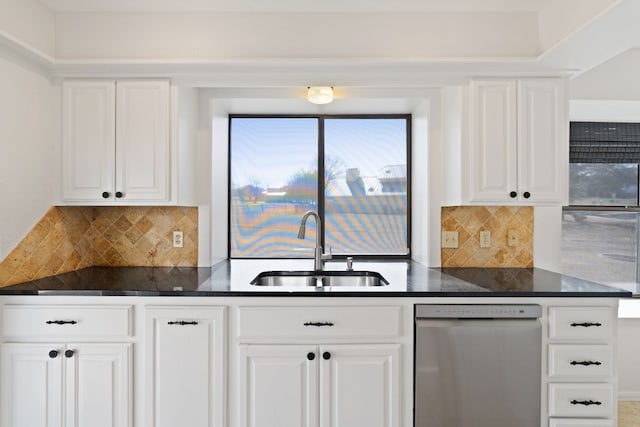 kitchen with white cabinetry, dishwasher, sink, and backsplash