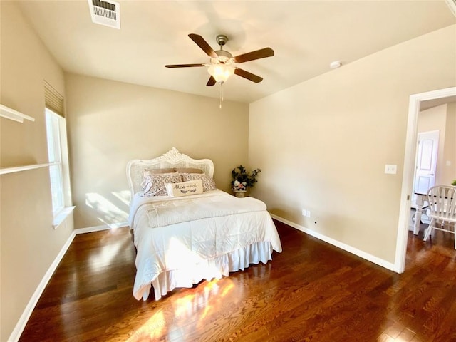 bedroom featuring dark wood-type flooring and ceiling fan