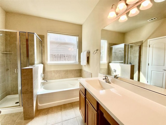 bathroom with vanity, separate shower and tub, tile patterned flooring, and a notable chandelier