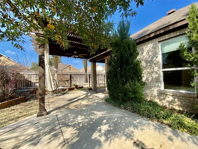 view of patio / terrace featuring a pergola