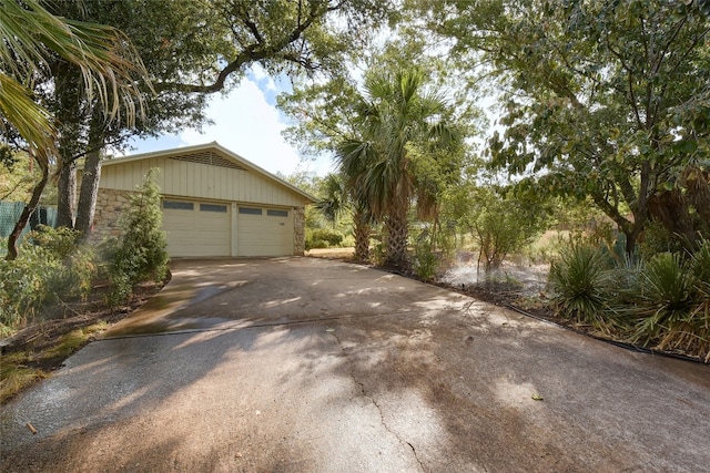 view of side of property featuring a garage