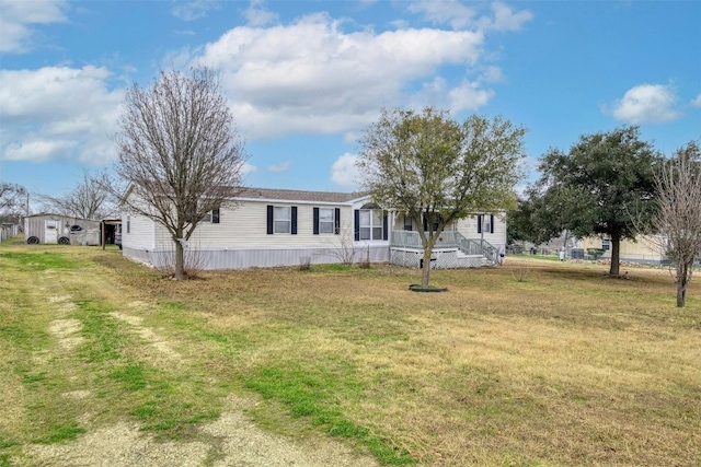 view of front of home with a front yard