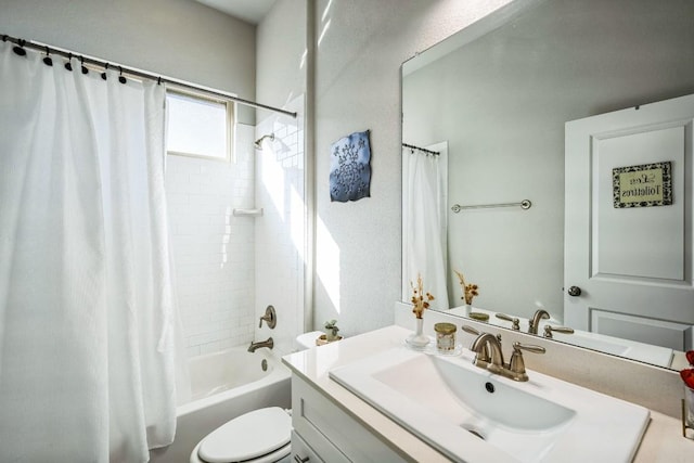 full bathroom featuring shower / tub combo with curtain, vanity, and toilet