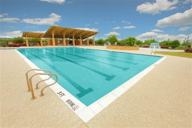 view of pool featuring a patio area