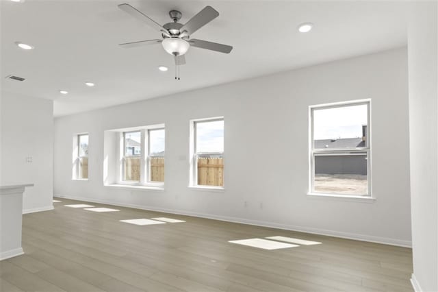 332 Witchhazel Way, San Marcos, TX 78666 - unfurnished room with recessed lighting, light wood-style flooring, baseboards, and a ceiling fan