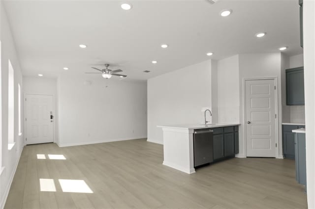 332 Witchhazel Way, San Marcos, TX 78666 - kitchen featuring stainless steel dishwasher, recessed lighting, ceiling fan, light countertops, and light wood-type flooring