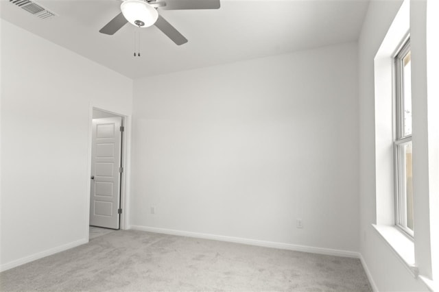332 Witchhazel Way, San Marcos, TX 78666 - empty room with light carpet, a ceiling fan, and baseboards