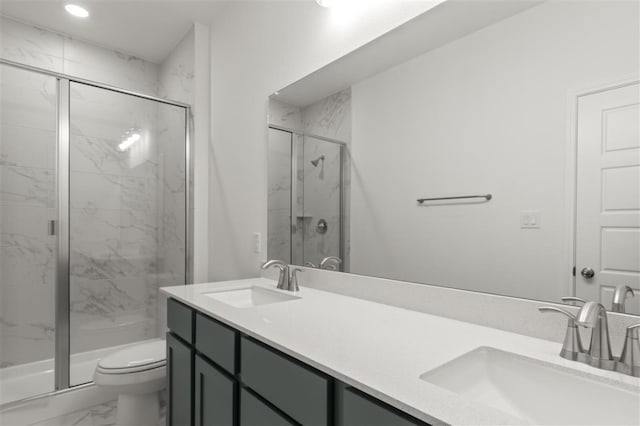332 Witchhazel Way, San Marcos, TX 78666 - bathroom with marble look tiles, double vanity, a marble finish shower, toilet, and recessed lighting