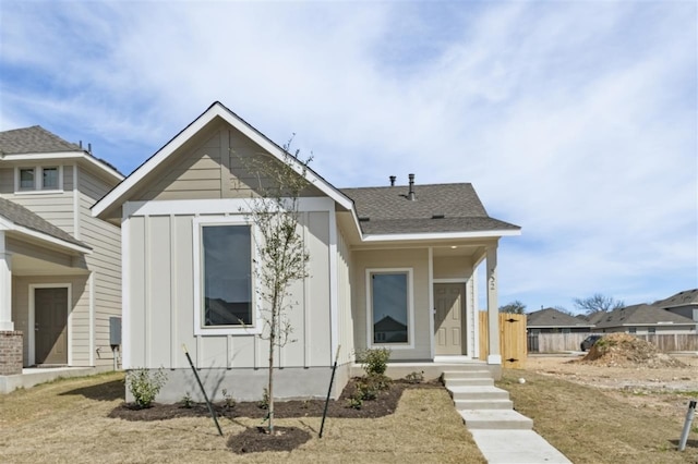332 Witchhazel Way, San Marcos, TX 78666 - bungalow-style home with board and batten siding and a shingled roof